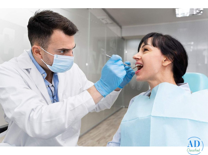 Smile Restoration with Full Mouth Rehabilitation in Homeland