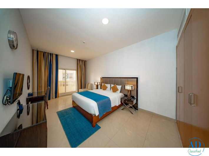 Buy a 2 BHK apartment with modern amenities in Noida Extension